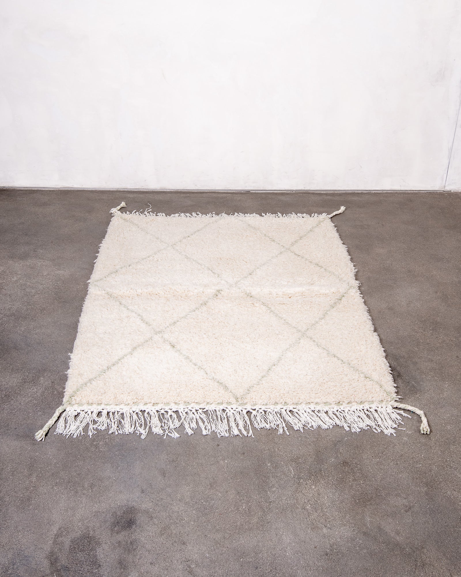 Modern, designer, handcrafted Berber rug from Morocco. Beniourain carpet with beautiful colours and patterns and fluffy wool texture.